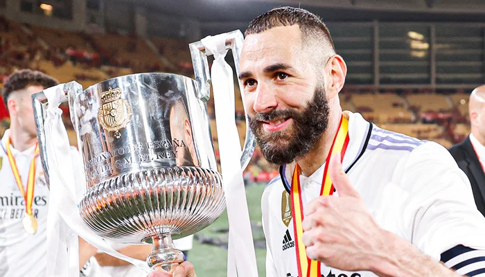 Karim Benzema with the Copa del Rey trophy